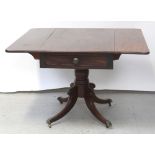 A George III mahogany pedestal Pembroke table with single frieze drawer over turned pedestal base