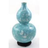 A Chinese porcelain double gourd vase in turquoise crackle glaze with painted decoration in the