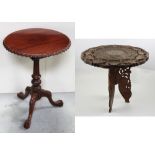 A modern mahogany snap-top table on birdcage pedestal tripartite base,