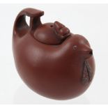 A small Yixing teapot in the form of a chicken, seal mark to base, height 7.5cm.