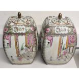 A pair of Chinese Famille Rose square-form ginger jars with floral and figural decoration (2).