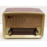 A vintage cream and burgundy Marconi radio, model no.T62DA.