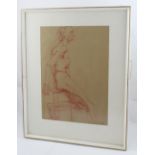 A lithographic print of a sanguine chalk study of a seated male nude,