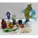 A small group of coloured glass to include a leaping fish, height 32cm, an elephant paperweight,