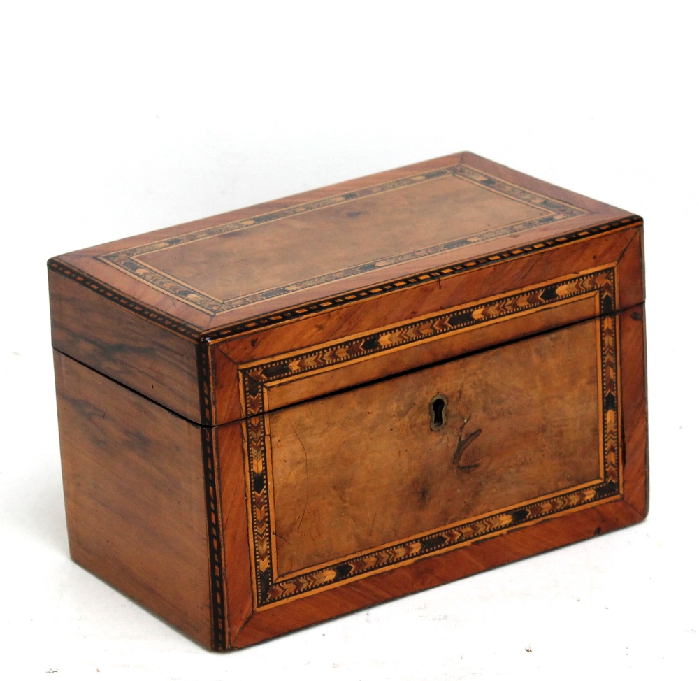 A Victorian walnut and inlaid two division tea caddy, width 20.5cm.Additional InformationHinges