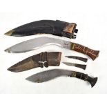 A early 20th century kukri knife in leather scabbard (lacking smaller knives), length 42cm, and a