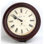 A circa 1900 mahogany circular wall clock, the enamel dial set with Roman numerals, with