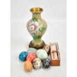 A group of ornamental resin eggs and two wooden examples, a 20th century Chinese cloisonné vase with