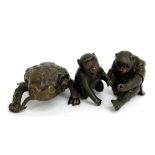 A Japanese Meiji period bronze toad and two Japanese bronze figures of monkeys (3).