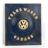 A decorative rectangular sign, inscribed Volkswagen Garage, 47 x 41cm.