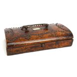 A George III mulberry stud decorated trinket box with hinged lid and simple iron handle, length