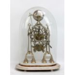 A late 19th century brass skeleton clock, the silvered chapter ring set with Roman numerals, with