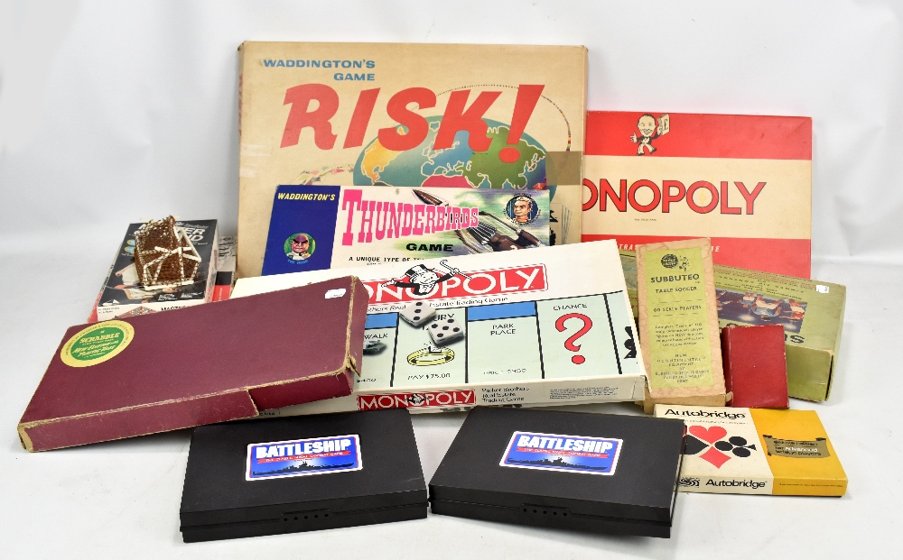 A collection of games including Subbuteo Table Soccer, Risk!, Monopoly etc.