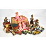 A mixed group of toys with tinplate and clockwork examples including USSR clapping monkey, model