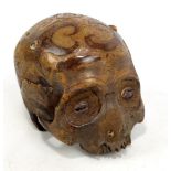 DAYAK TRIBE OF BORNEO; a rare hand carved human head hunting trophy skull with shell inlaid detail