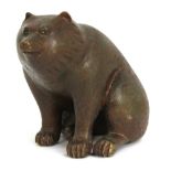 A Japanese Meiji period bronze model of a seated bear, signed to base, height 11cm. Additional