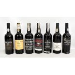 Seven bottles of 1980s vintage port comprising Porto Barros 1980, Borges 1980, Taylor's 1983,