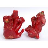 Two Chinese natural coral snuff bottles, height 8cm and 7.75cm (2).