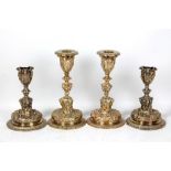 A pair of heavily decorated electrotype candle holders with gilt decoration, height 16.5cm, and a