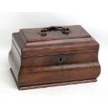 A George III mahogany sarcophagus form tea caddy, now with divided interior, width 25.5cm.Additional