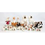 A group of ceramic figures including Royal Worcester 'January', Beswick cow and calf (latter left