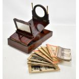 A late Victorian rosewood and simulated rosewood stereoscope sold with a number of cards.