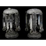 A pair of Victorian hobnail cut clear glass table lustres with prism drops, height 33cm.