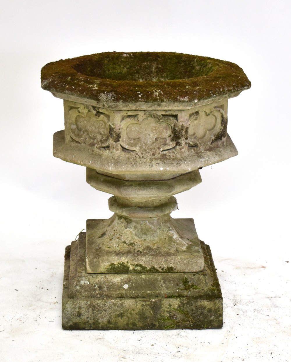 A large reconstituted garden urn, height 77cm.