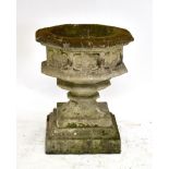 A large reconstituted garden urn, height 77cm.