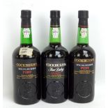 COCKBURN'S; three bottles of port, two 'Special Reserve' and the other 'Fine Ruby', all 20% 70cl (