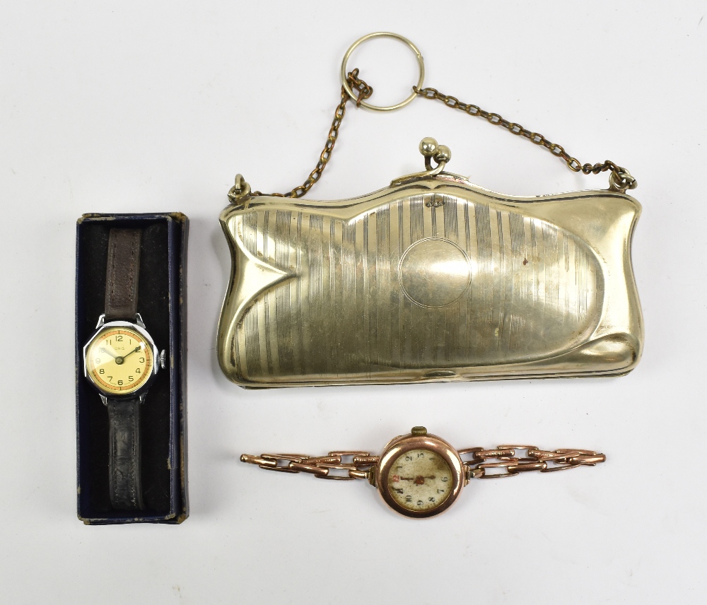 A lady's 9ct yellow gold cased mechanical wristwatch on yellow metal bracelet stamped '9ct',