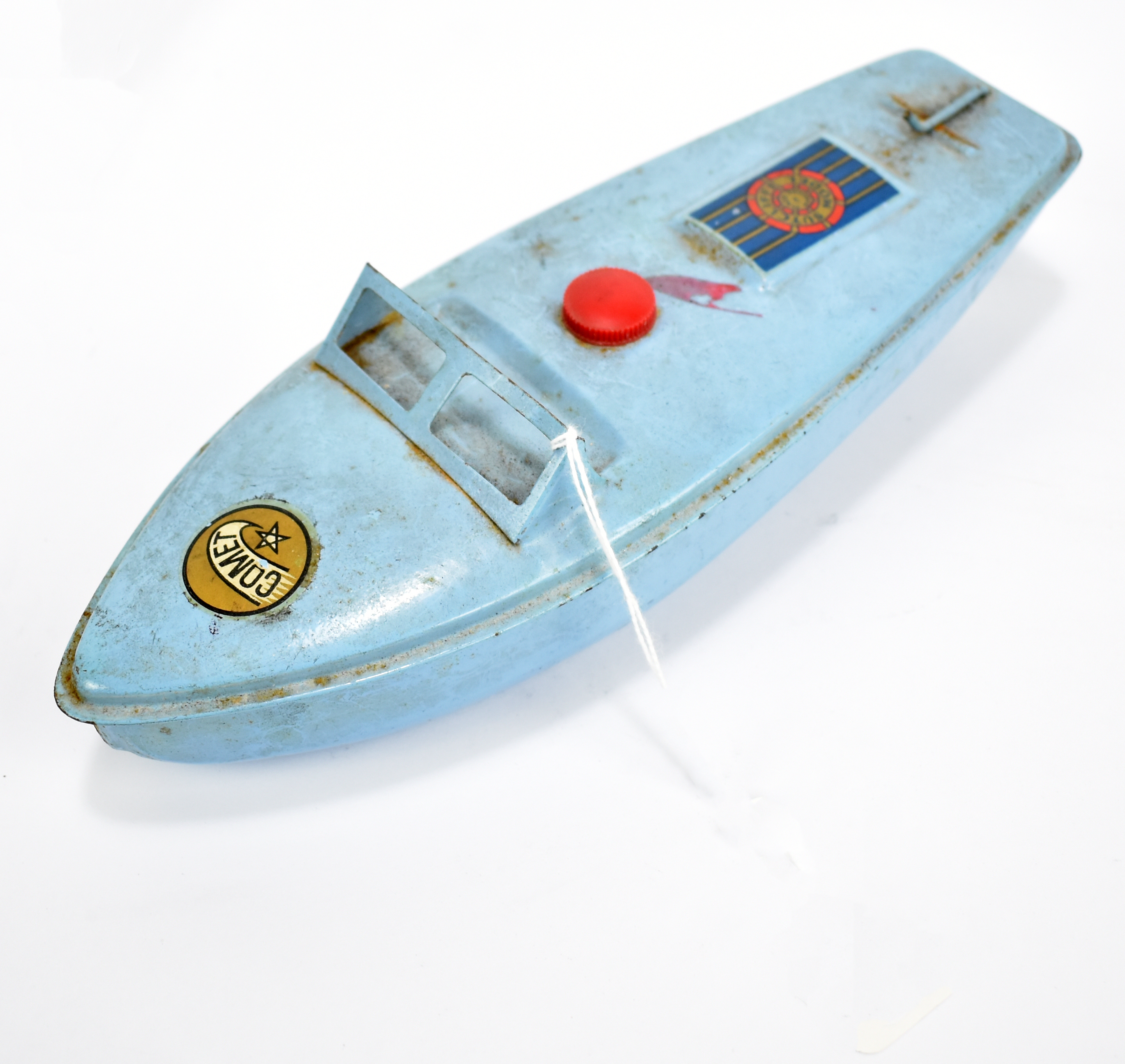 SUTCLIFFE; a tinplate model boat with 'Comet' and manufacturer decals in light blue, playworn.