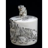 A Japanese Meiji period ivory tea caddy of cylindrical form with tiger cub mount to the lid and