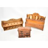 Two rustic pine spoon racks, a small group of spoons and a six-drawer spice chest (3).