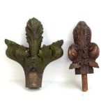 A stone roof finial and a carved oak finial (2).