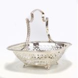 ASPREY; a George V hallmarked silver pierced sweet meat dish, with cast decoration to the handle and