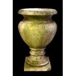 A large 19th century white marble urn raised on so