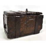 A 16th century iron bound rectangular casket with simple hinged lid, split pin set side carrying