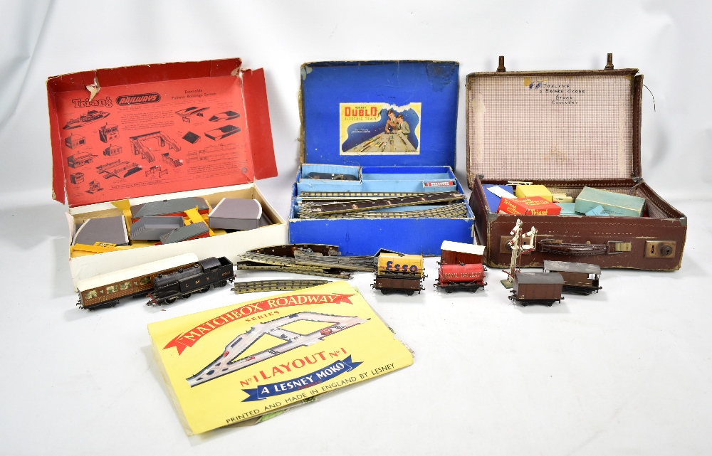 A quantity of Hornby Dublo including a boxed set of track, various accessories, also a boxed Tri-ang