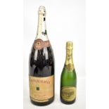 A bottle of Pennrich 1874 Medium Deutscher Sekt, and a bottle of Perrier Jouet champagne, 12%