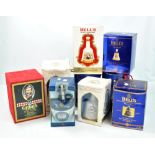 BELL'S; a collection of blended whisky in commemorative ceramic decanters.