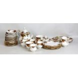 ROYAL ALBERT; an 'Old Country Roses' pattern part tea set including teapot (second), cups,