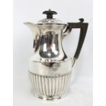 ATKIN BROTHERS; an Edward VII hallmarked silver coffee pot initialled 'G' with gadrooned detail,