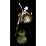 An Art Deco ivory and bronze figure of a female dancer (left hand af) on tapered onyx plinth base,