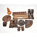 A collection of 18th and 19th century treen including two plaster moulds for picture frames,
