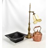 A small collection of metalware comprising brass lamp, copper kettle and bowl (3).