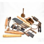 A quantity of predominantly 19th century treen including kitchen tools, chopper, press etc.