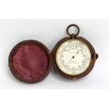 A cased brass pocket barometer, inscribed to the dial 'Compensated' Ross Arrow SS Ltd 31 Coxburgh St