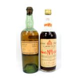 A single bottle of Pimm's No.1 Cup 'The Original Gin Sling', 60 proof, and a bottle of Grande