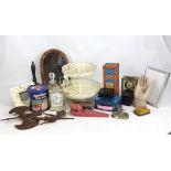 A mixed group of items to include advertising tins, a brass tobacco tin, two battery operated